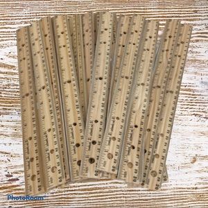 NEW. Set of 30 wooden rulers with metal edge.